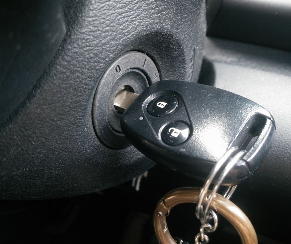 Professional locksmith inspecting car key in Crawley