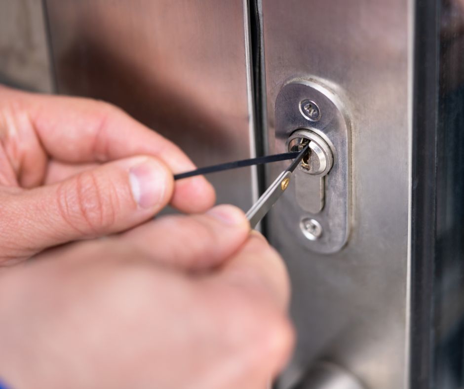 Locksmith in Crawley installing high-security lock on a door